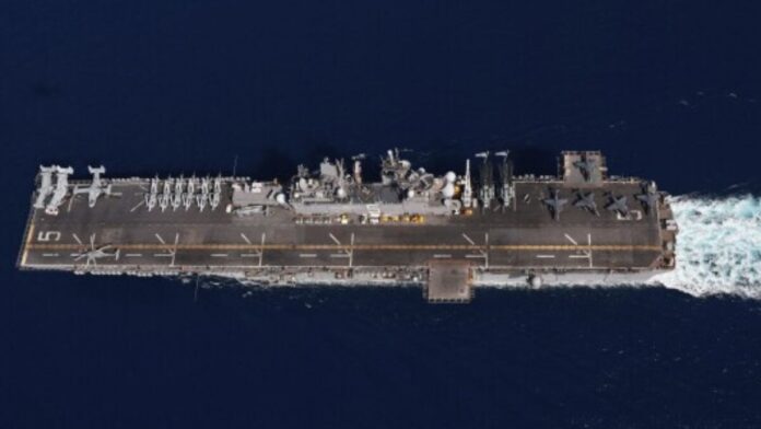 iran-preps-missiles,-threatens-to-mine-key-strait-if-us-joins-israel-war:-report