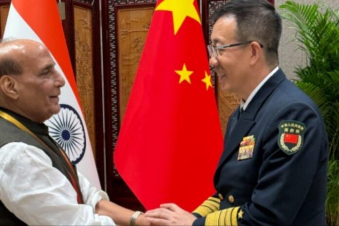 rajnath-singh-meets-chinese-counterpart-in-qingdao,-gifts-him-madhubani-painting-from-bihar