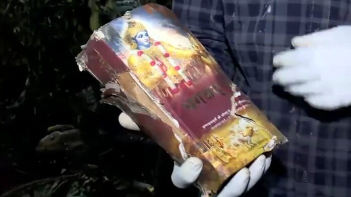 almost-intact-bhagavad-gita-emerges-from-burnt-debris-at-air-india-crash-site