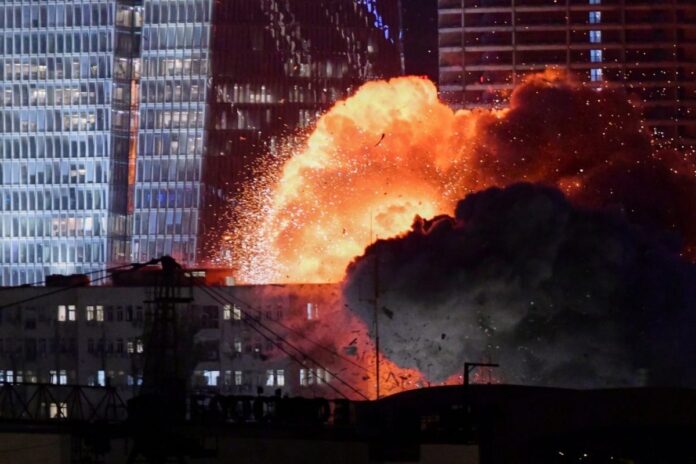 tel-aviv-hit,-at-least-one-killed-as-iran-fires-hundreds-of-ballistic-missiles-toward-israel