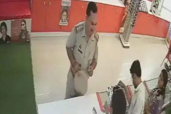 up-cop-refuses-to-pay-for-glasses,-threatens-shopkeeper-in-mirzapur;-video-goes-viral