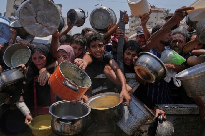 facing-pressure,-israel-opens-aid-routes-in-gaza-with-daily-ceasefire