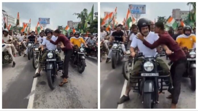 video:-man-kisses-rahul-gandhi-on-bike-during-bihar-rally; gets slapped-by-guard