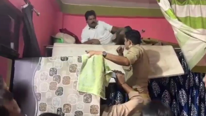 video:-dramatic-arrest-of-samajwadi-leader,-up-cops-find-him-hiding-behind-mattress