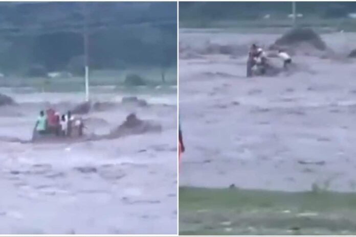 tractor-trolley-with-10-labourers-swept-away-after-cloudburst,-flash-floods-in-dehradun-|-video